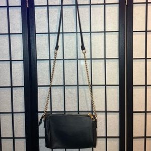 Black purse with gold chain